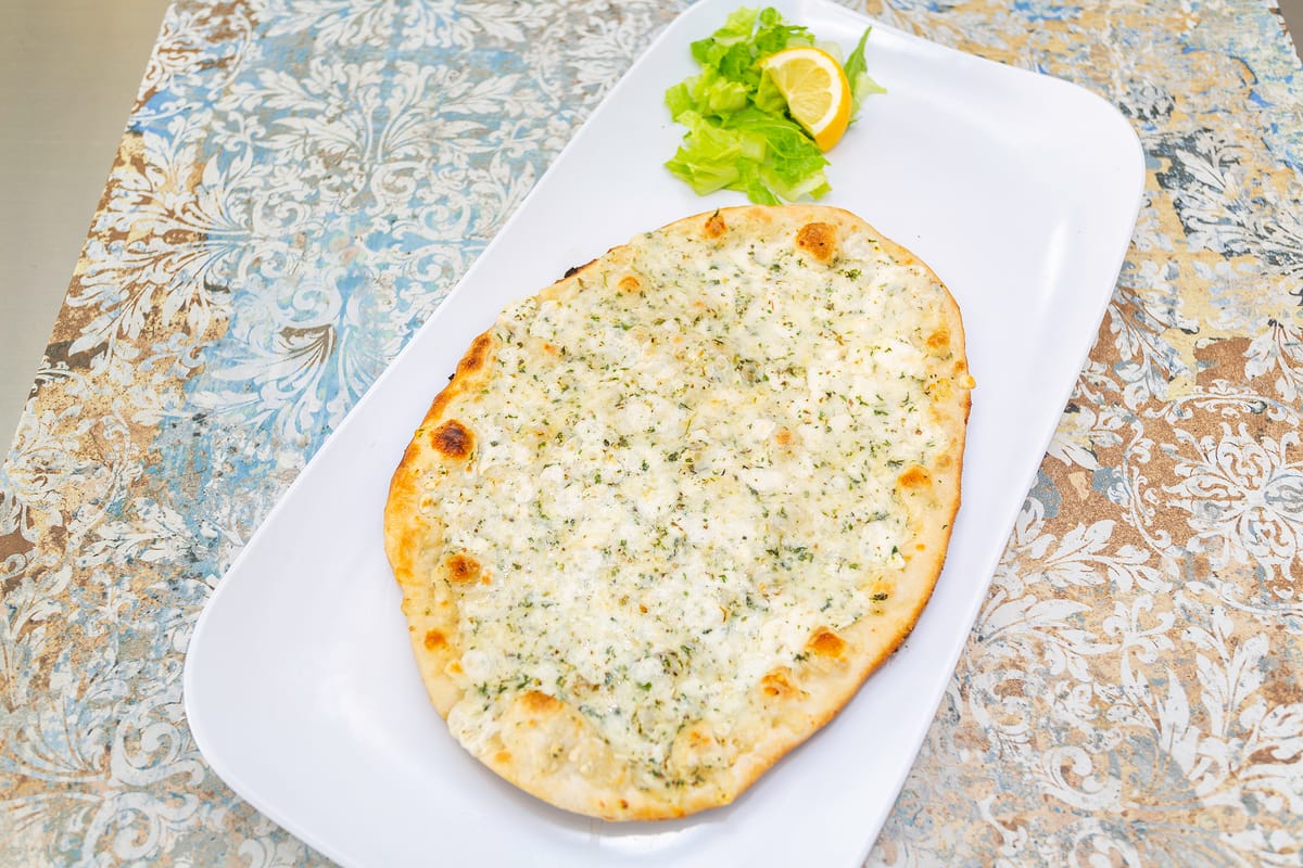 Beef shawarma wrap with fresh vegetables from Taza
